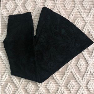 Black and emerald green bell bottoms